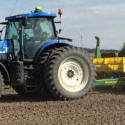 Planting seeds in field photo